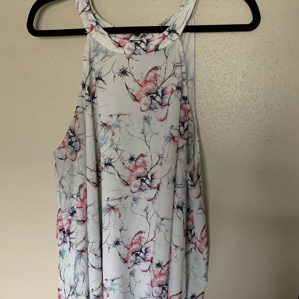 White floral top with flowing detail